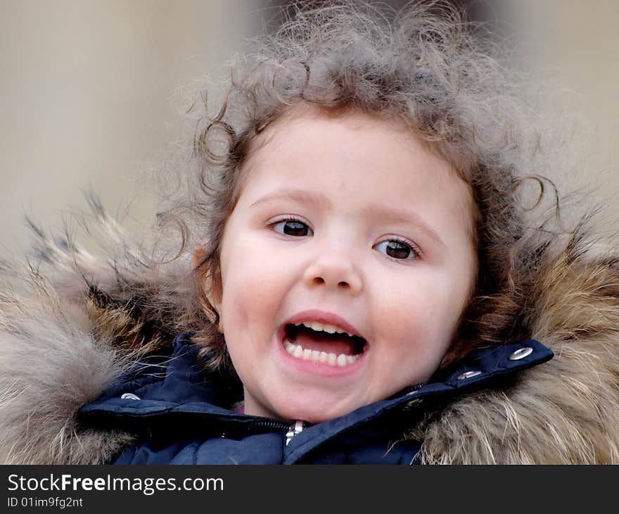 A wonderful image of a little smiling baby. A wonderful image of a little smiling baby