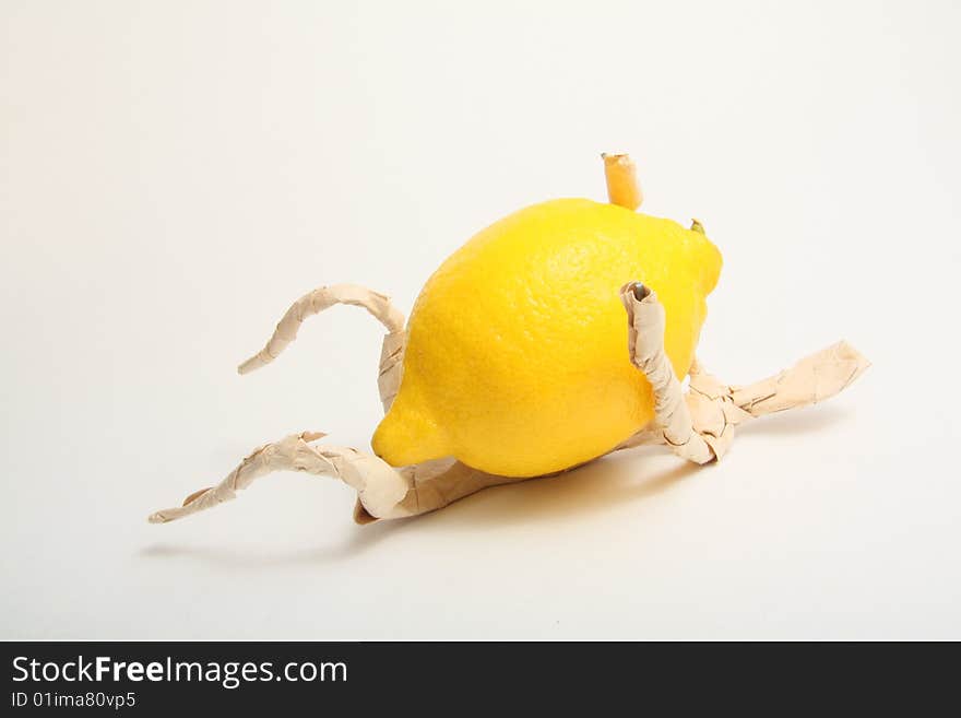 Figure of paper man with lemon. Figure of paper man with lemon