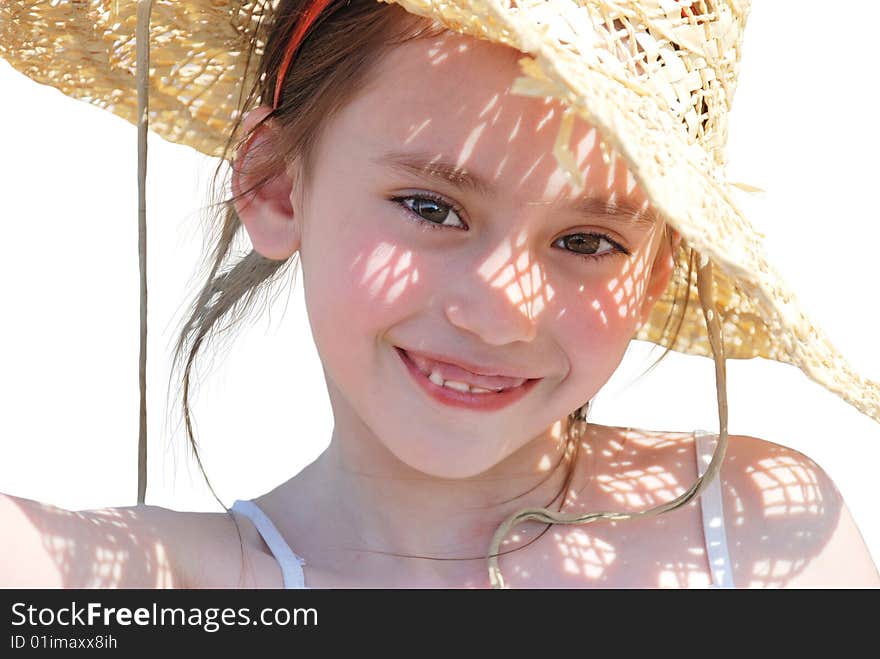 The happy girl in a hat in a sunny day on a white background. The happy girl in a hat in a sunny day on a white background