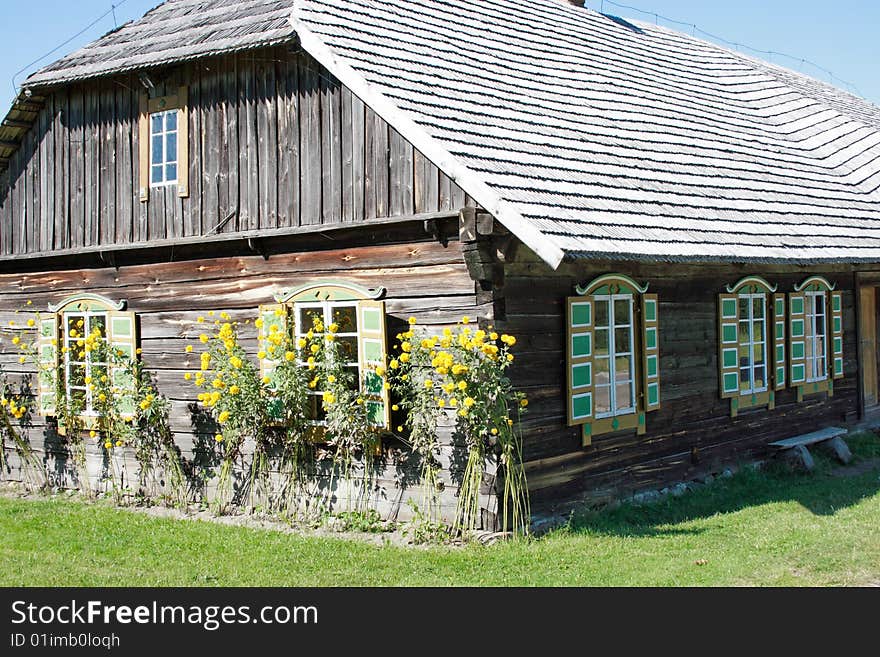 Old wooden countryside house with flours, Lithuania. Old wooden countryside house with flours, Lithuania