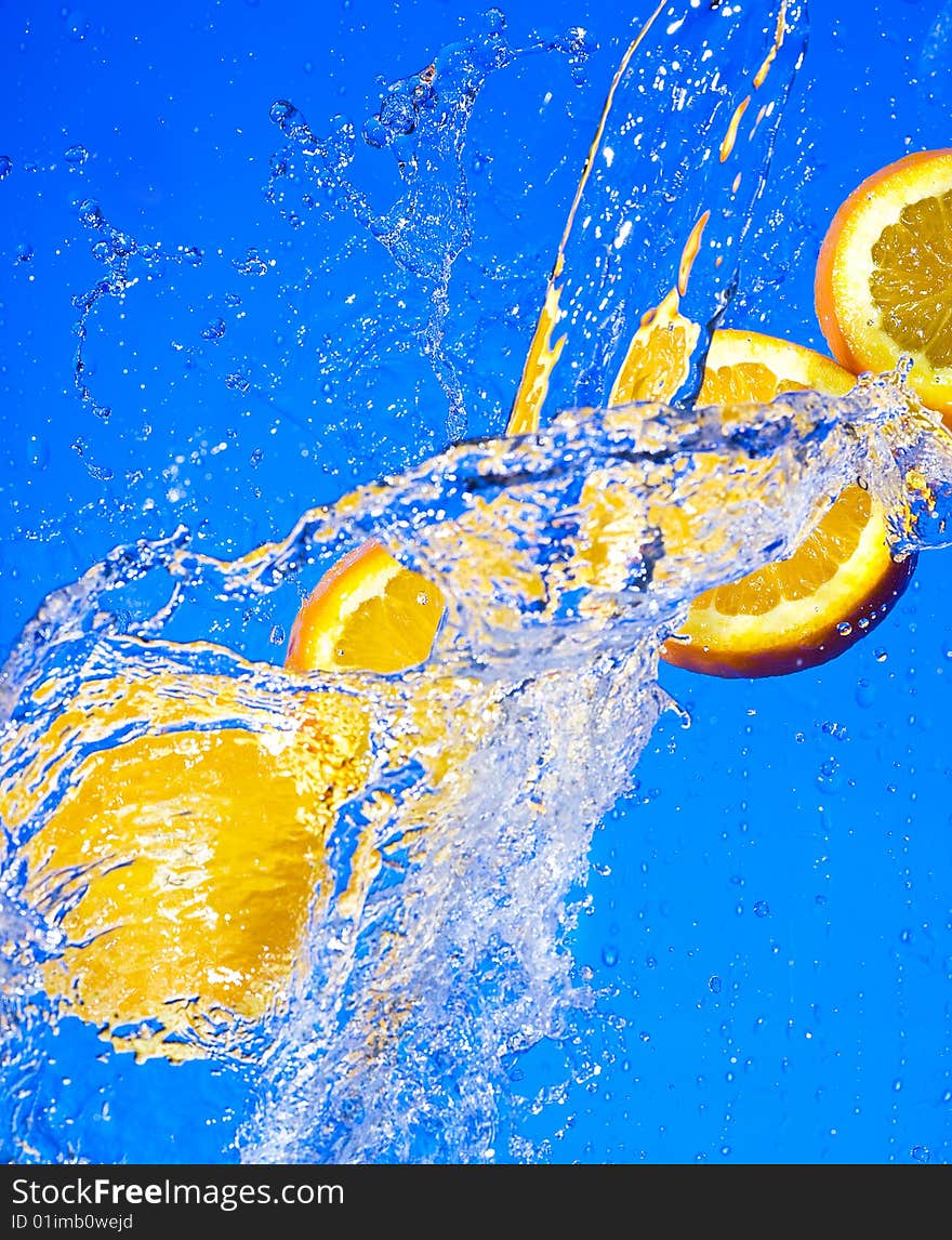 Orange with creative splashing water