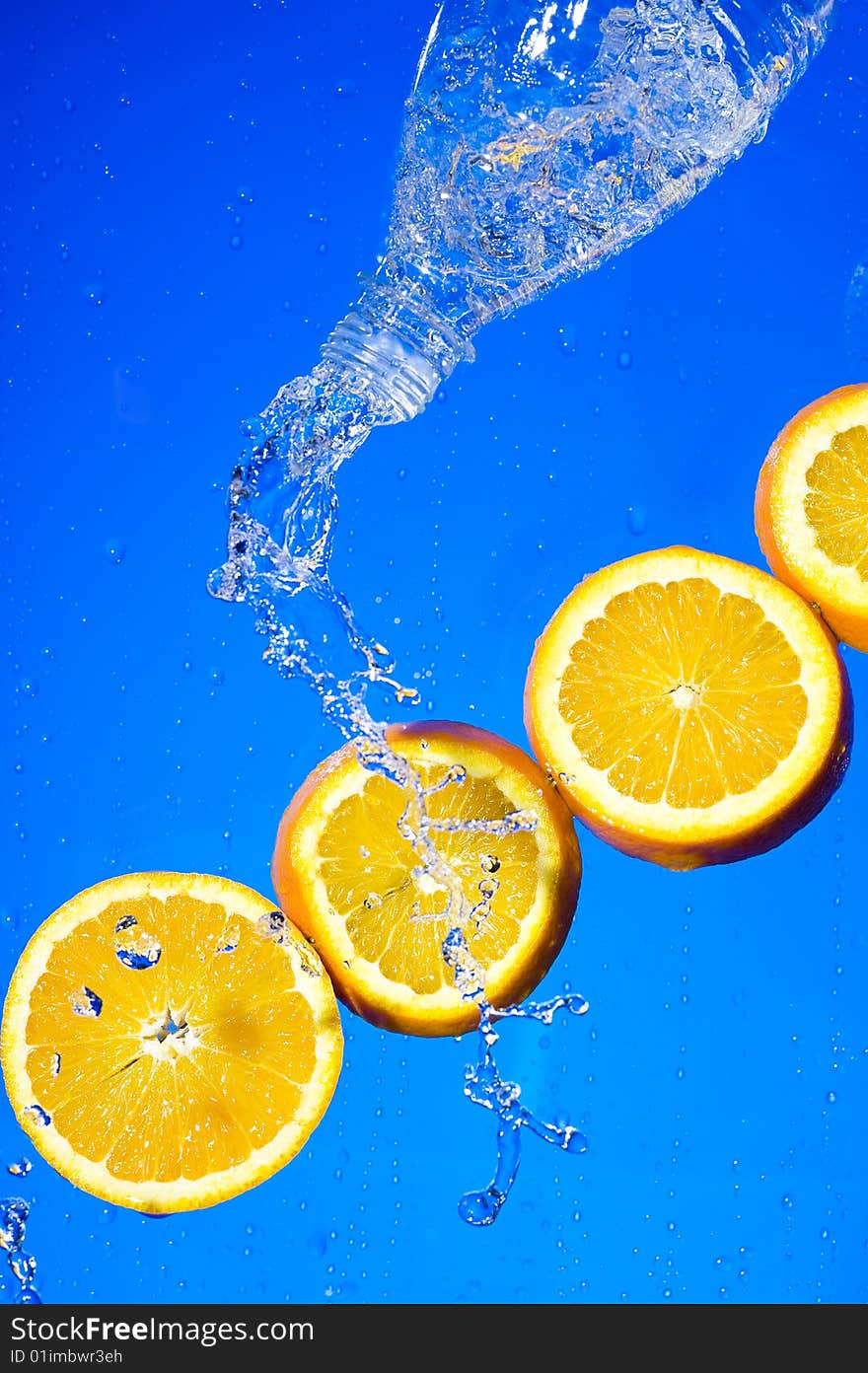 Orange with creative splashing water