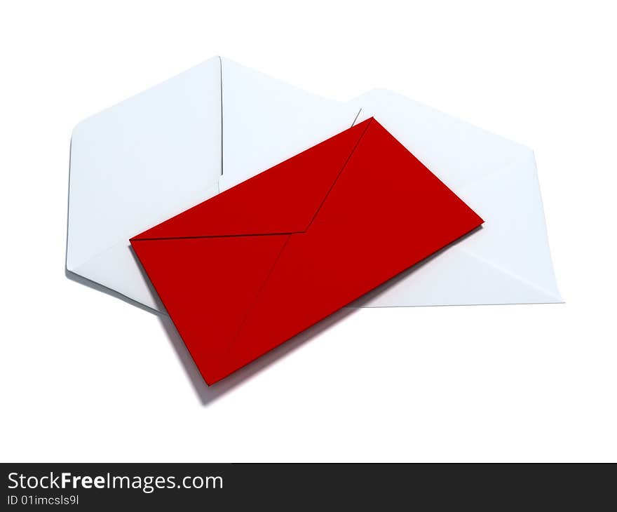 Red envelope layiing on two white envelopes