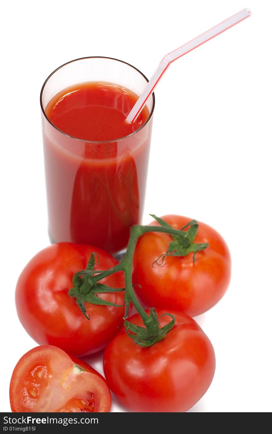 Fresh juicy tomatoes and tomato juice on a white background