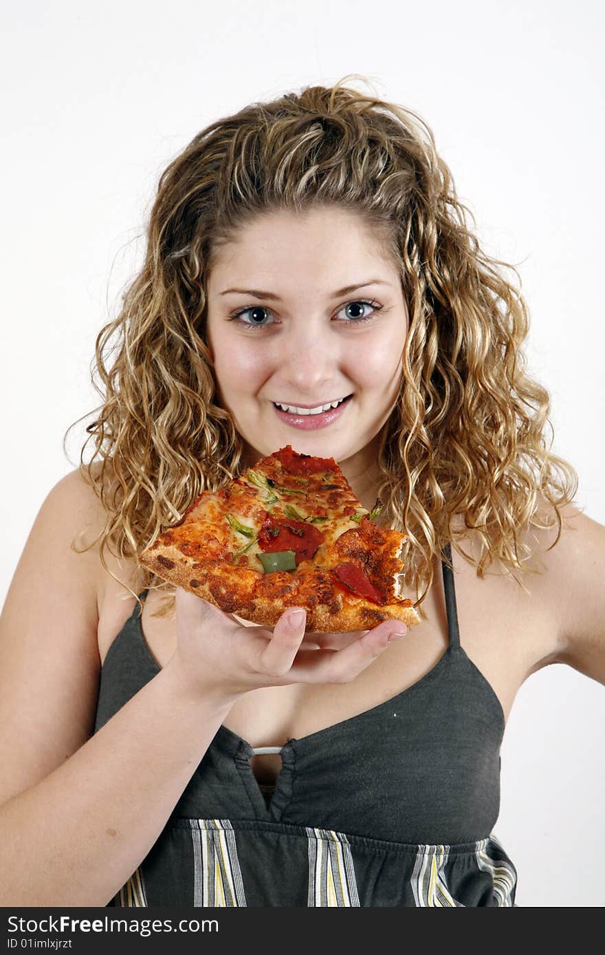 Girl eating pizza slice