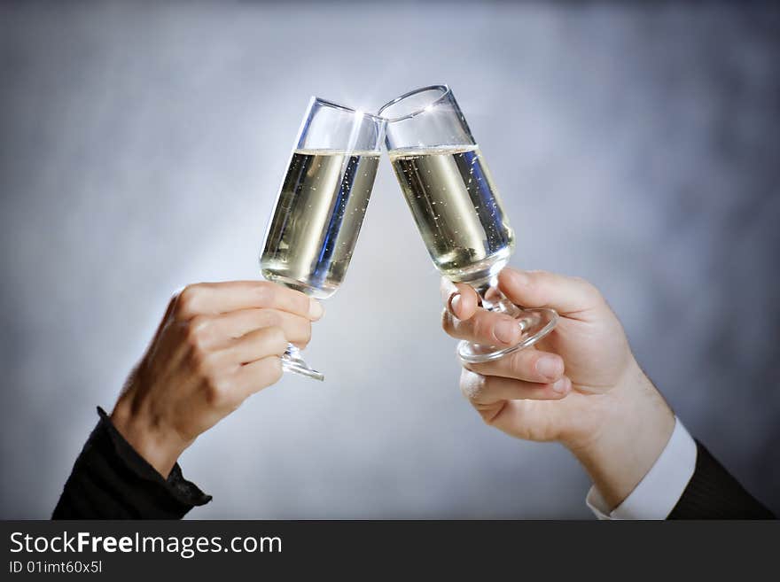 Cropped view of heterosexual couple toasting. Copy space