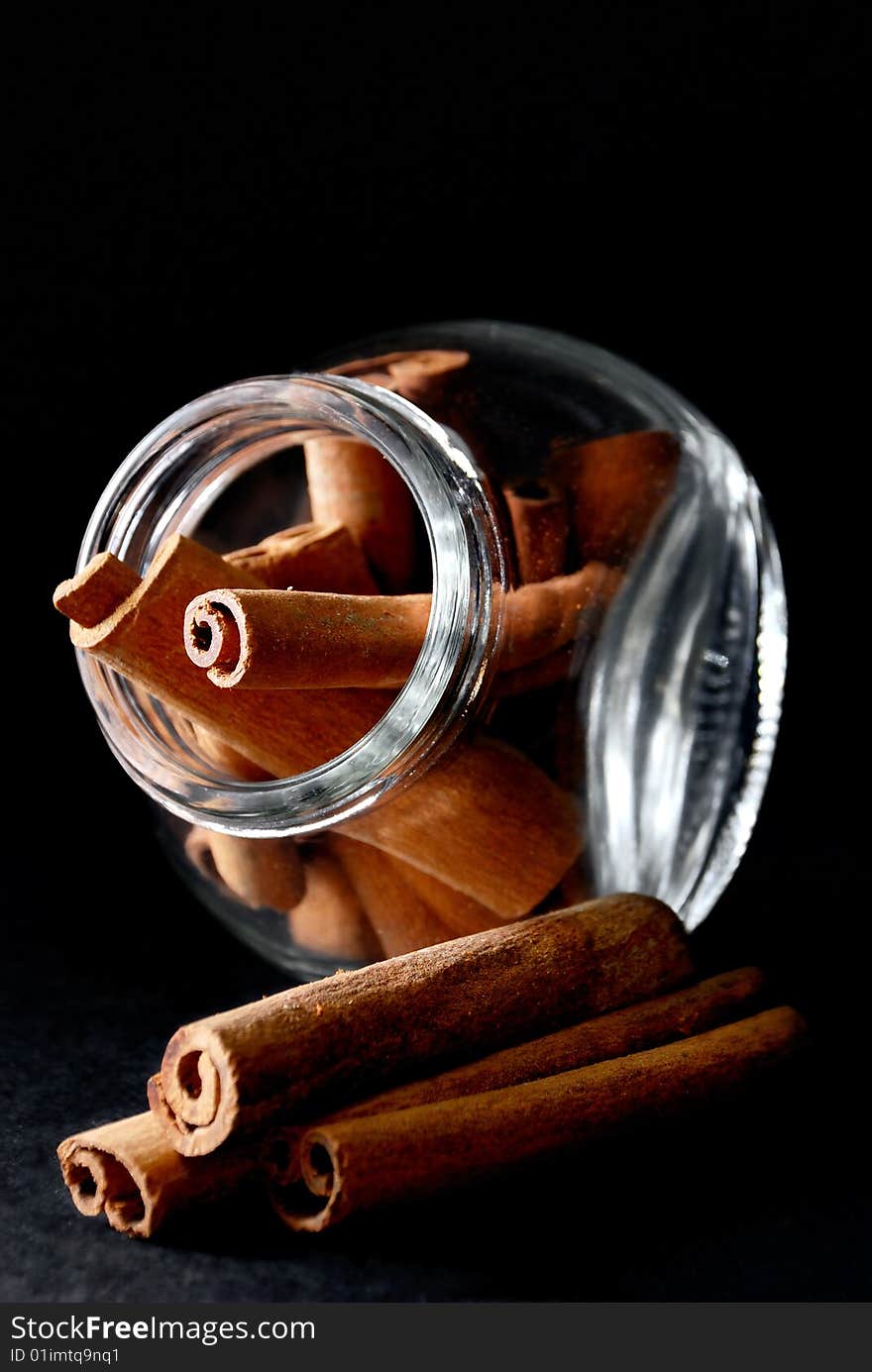 Cinnamon Stick in transparent container. Cinnamon Stick in transparent container