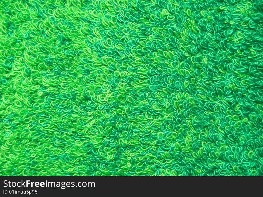 Beautiful background from a green towel.