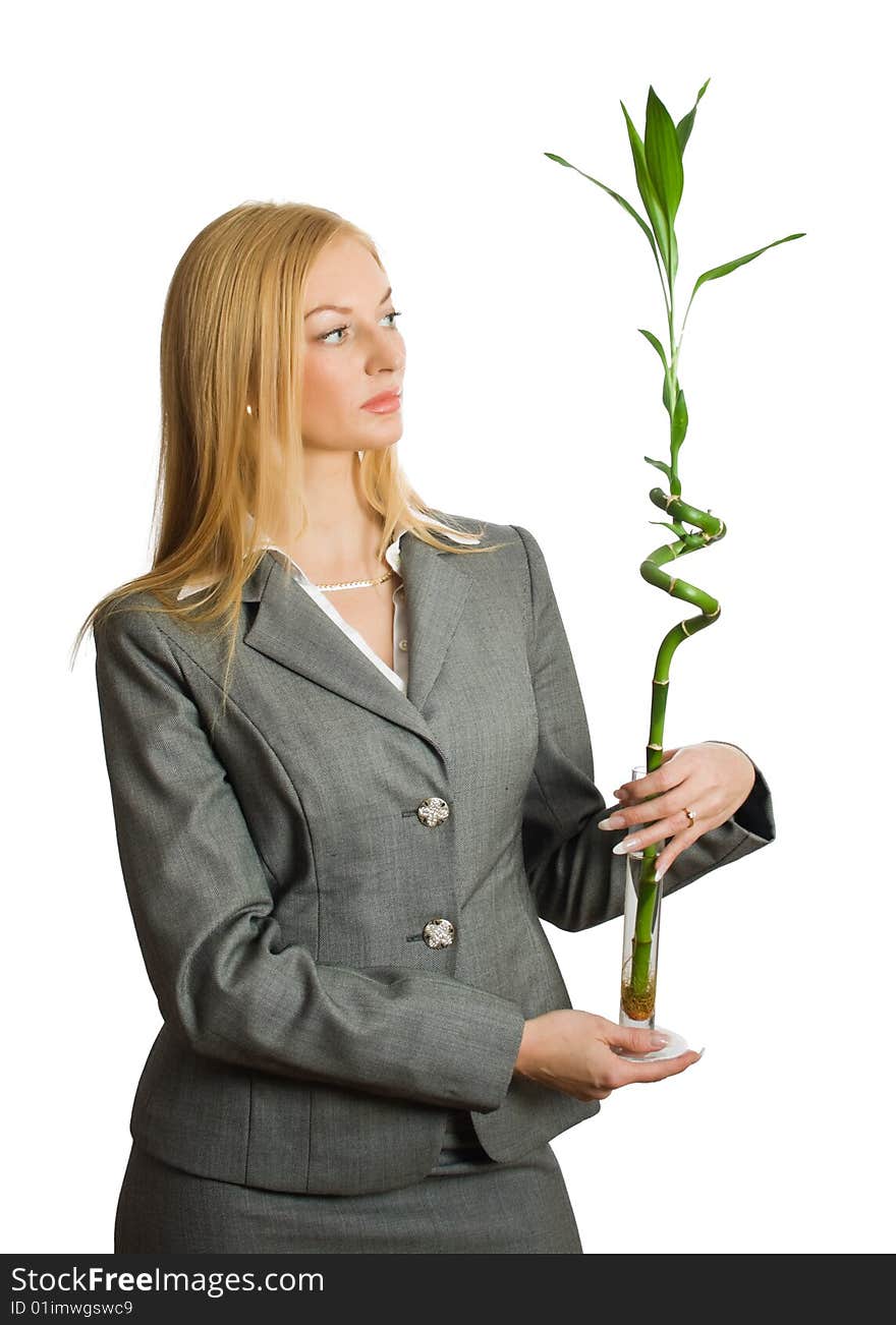 Pretty businesswoman with bamboo isolated over white with clipping path