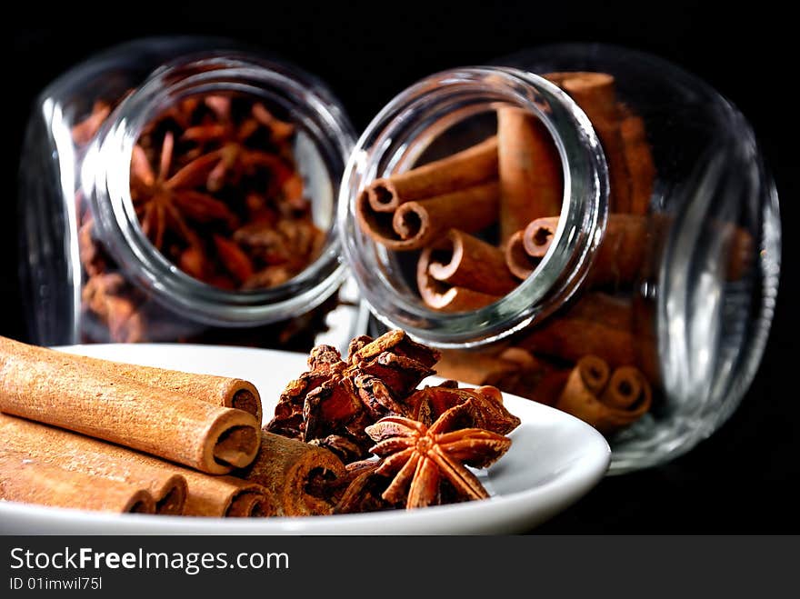 Cinnamon Stick and Anise Star in transparent container. Cinnamon Stick and Anise Star in transparent container