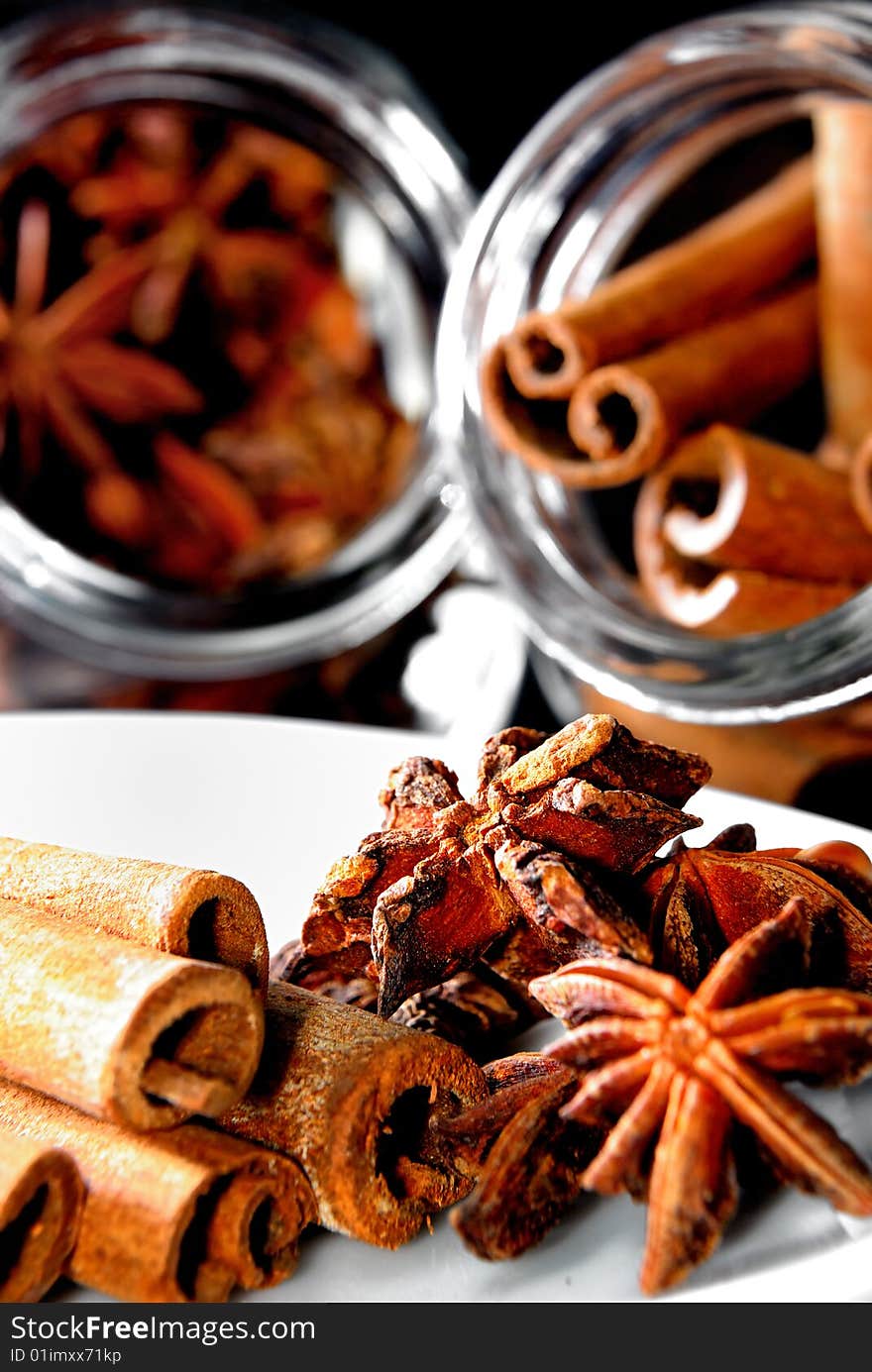 Cinnamon Stick and Anise Star in transparent container. Cinnamon Stick and Anise Star in transparent container