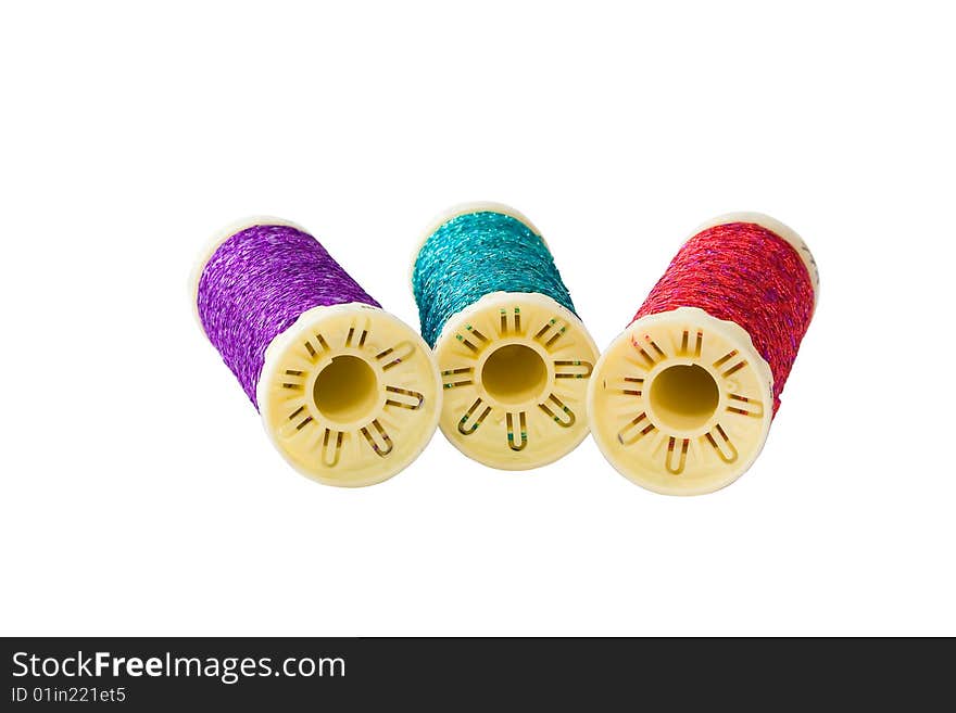 Threads on spool isolated on white background