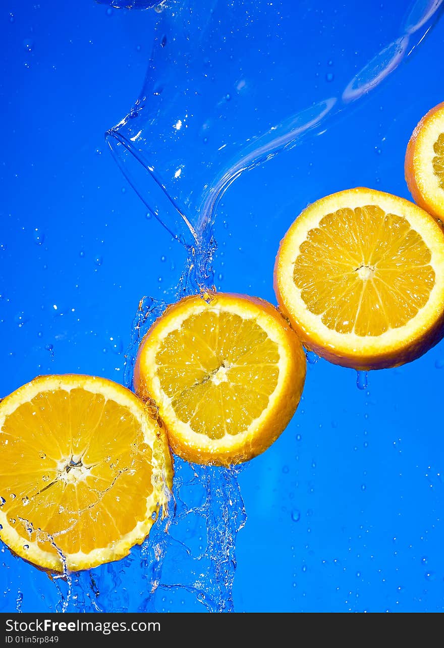 Orange with creative splashing water