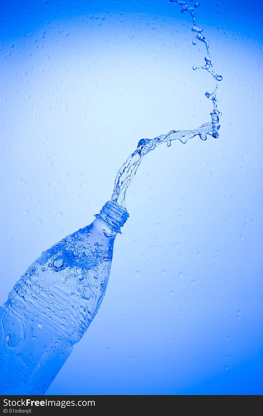 Bottle with creative splashing water