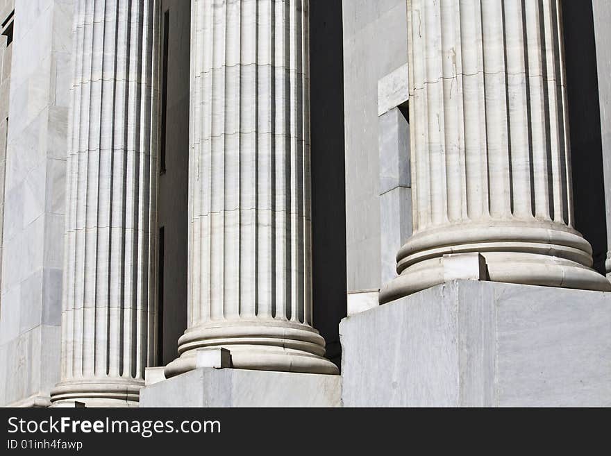 Detail image of Greek pillars in a bank building in Greece