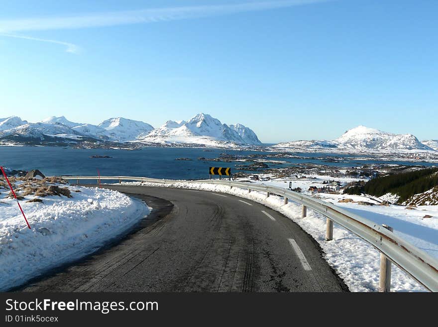 Dangerous turn left on einangen pass, Lofoten islands, norwegian arctic region. Dangerous turn left on einangen pass, Lofoten islands, norwegian arctic region