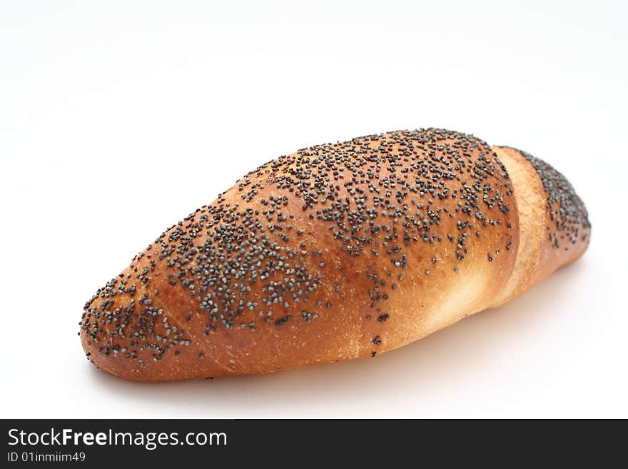 Fresh bun with poppy seed isolated on white