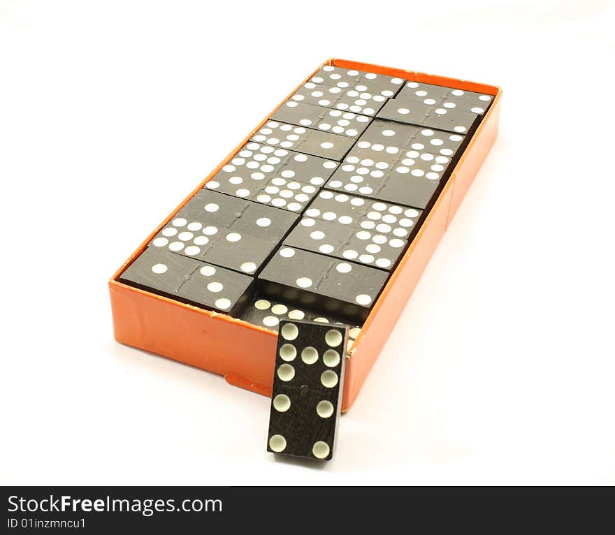 Box of dominoes isolated on a white background.