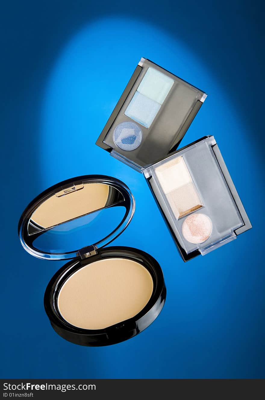 Cosmetics On Blue Background