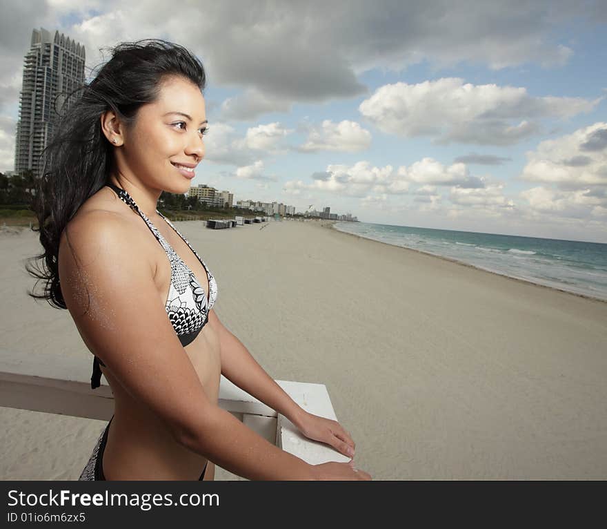 Beautiful young woman on the beach