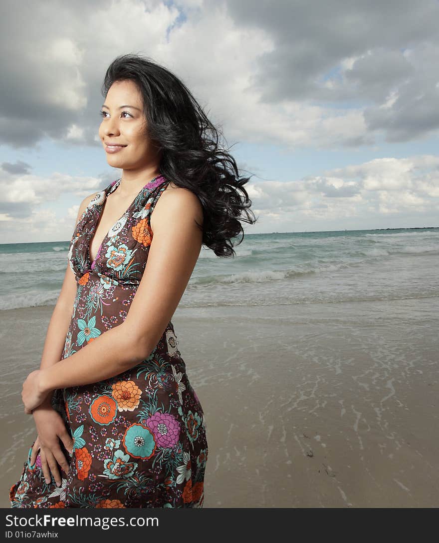 Beautiful young brunette on the beach. Beautiful young brunette on the beach