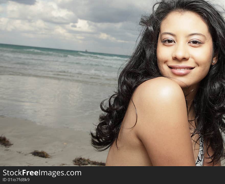 Young woman smiling at the camera. Young woman smiling at the camera