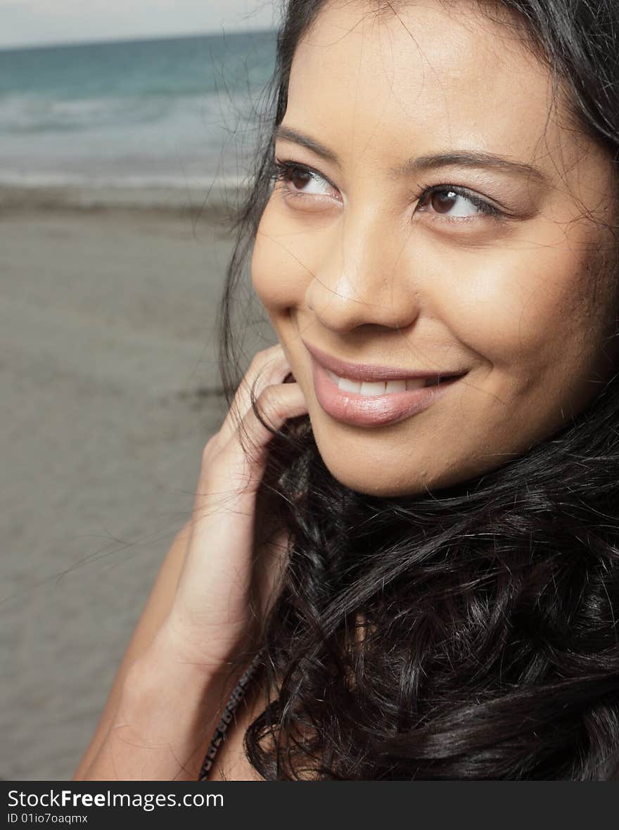 Young woman smiling and looking away