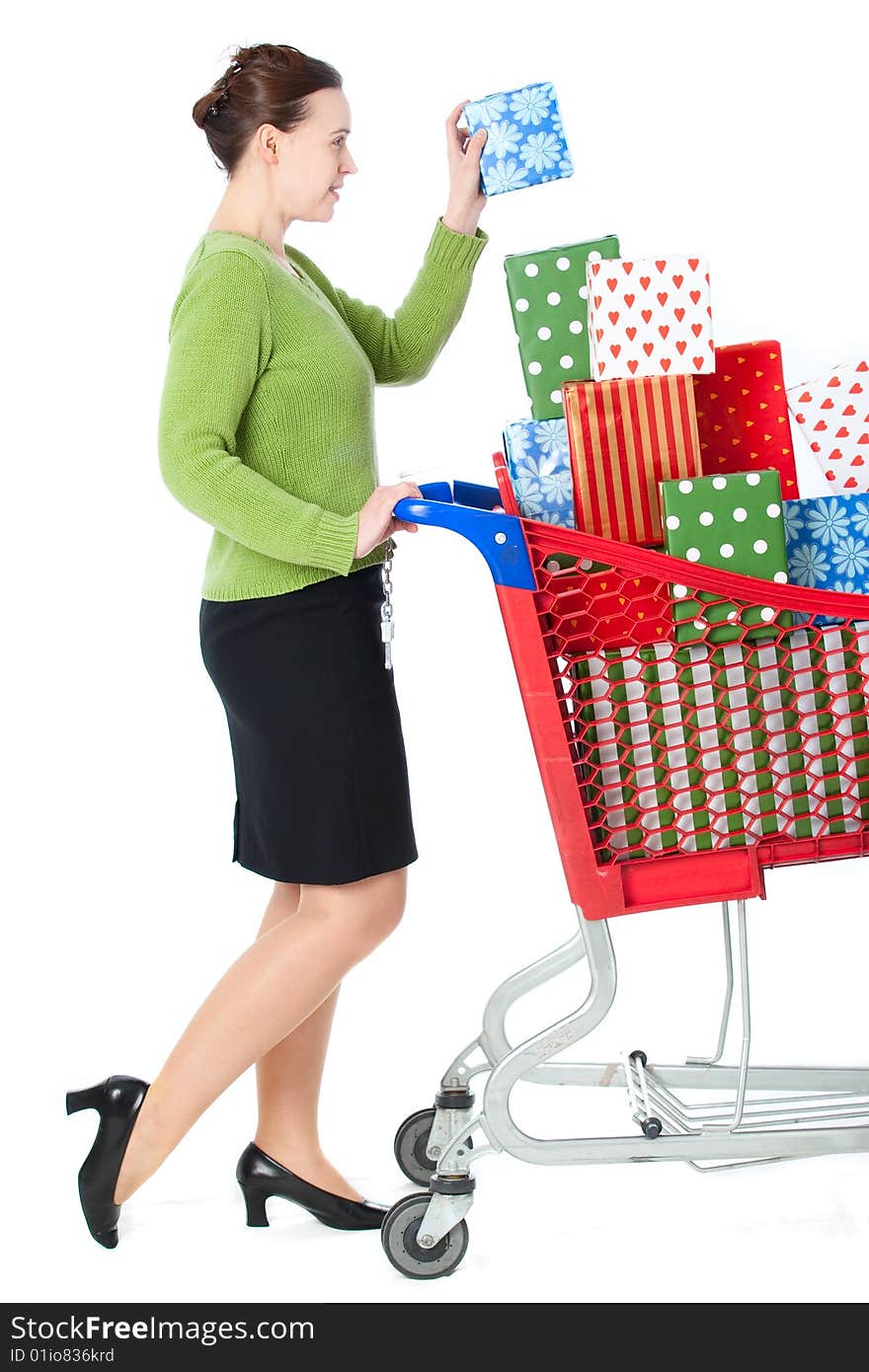 A woman shopping for gifts on a white background. A woman shopping for gifts on a white background