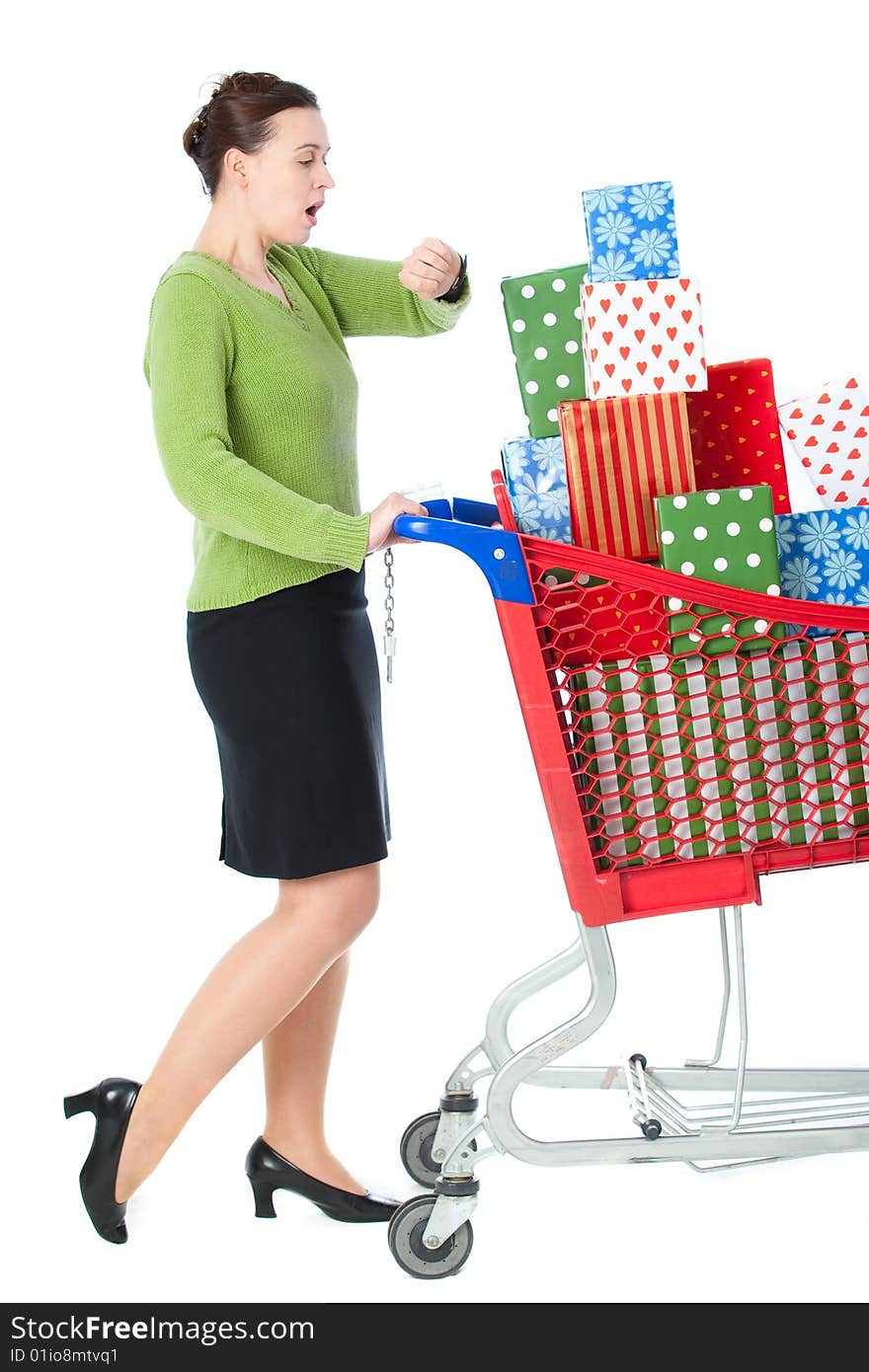 A woman in a shopping scenario late for something and under stress. A woman in a shopping scenario late for something and under stress