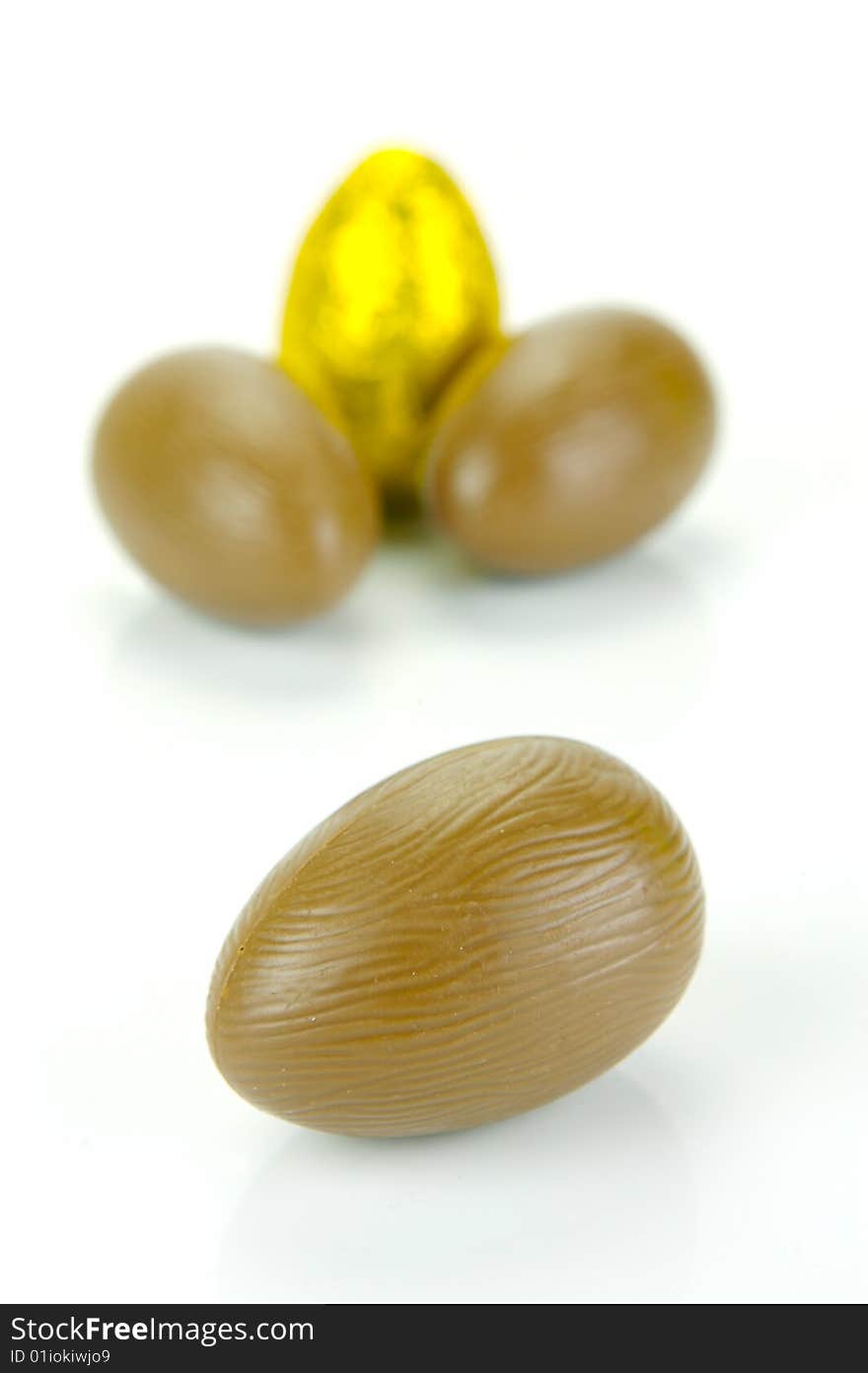 Chocolate easter eggs isolated against a white background