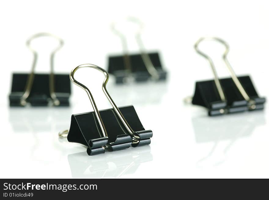 Paper clips isolated against a white background. Paper clips isolated against a white background