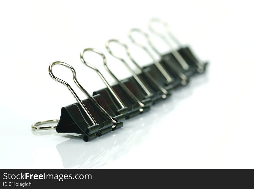 Paper clips isolated against a white background. Paper clips isolated against a white background