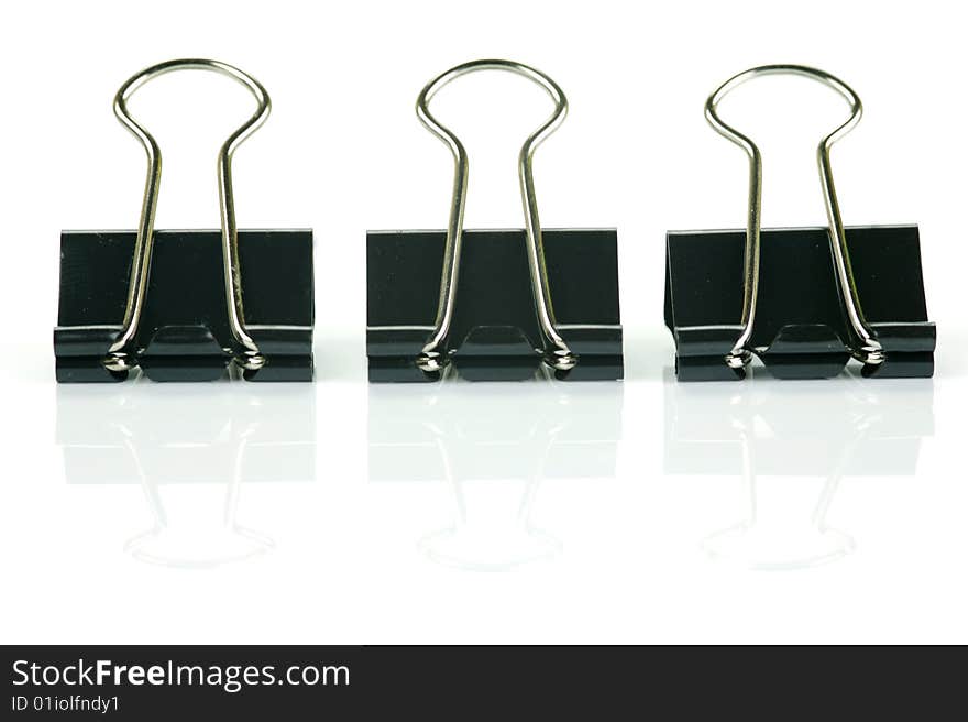 Paper clips isolated against a white background. Paper clips isolated against a white background