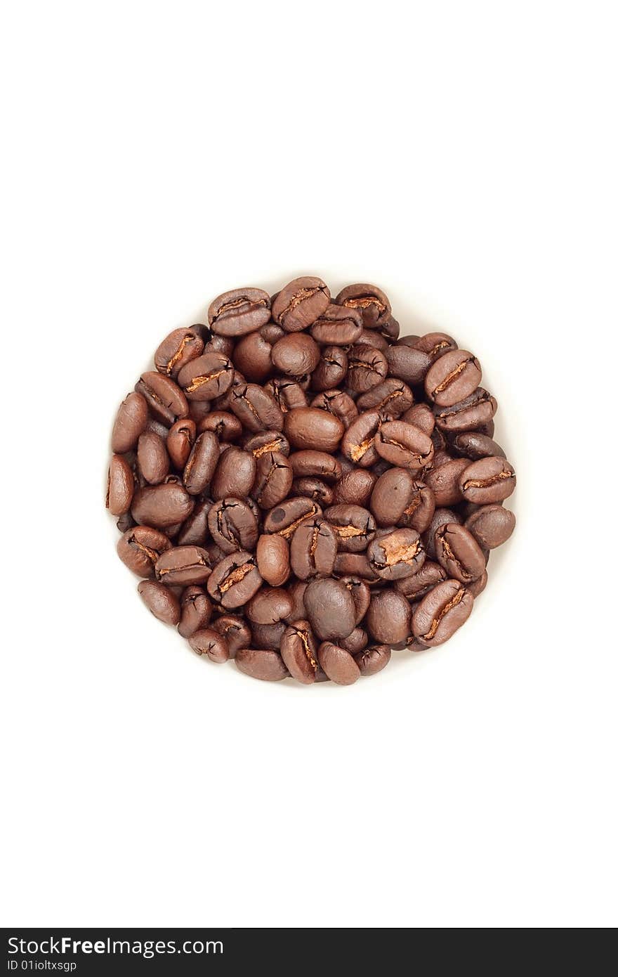 Circle of freshly roasted espresso coffee beans isolated on white. Circle of freshly roasted espresso coffee beans isolated on white