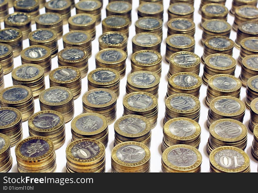 Ten-rouble coins arranged in a rows