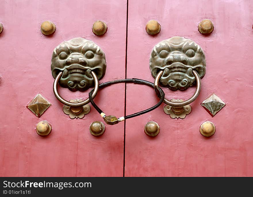 Chinese temple door with lion knob. Chinese temple door with lion knob