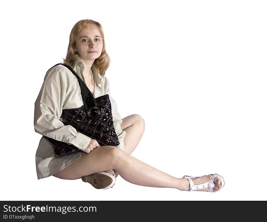 Sitting woman with black haversack. Isolate over white. Sitting woman with black haversack. Isolate over white