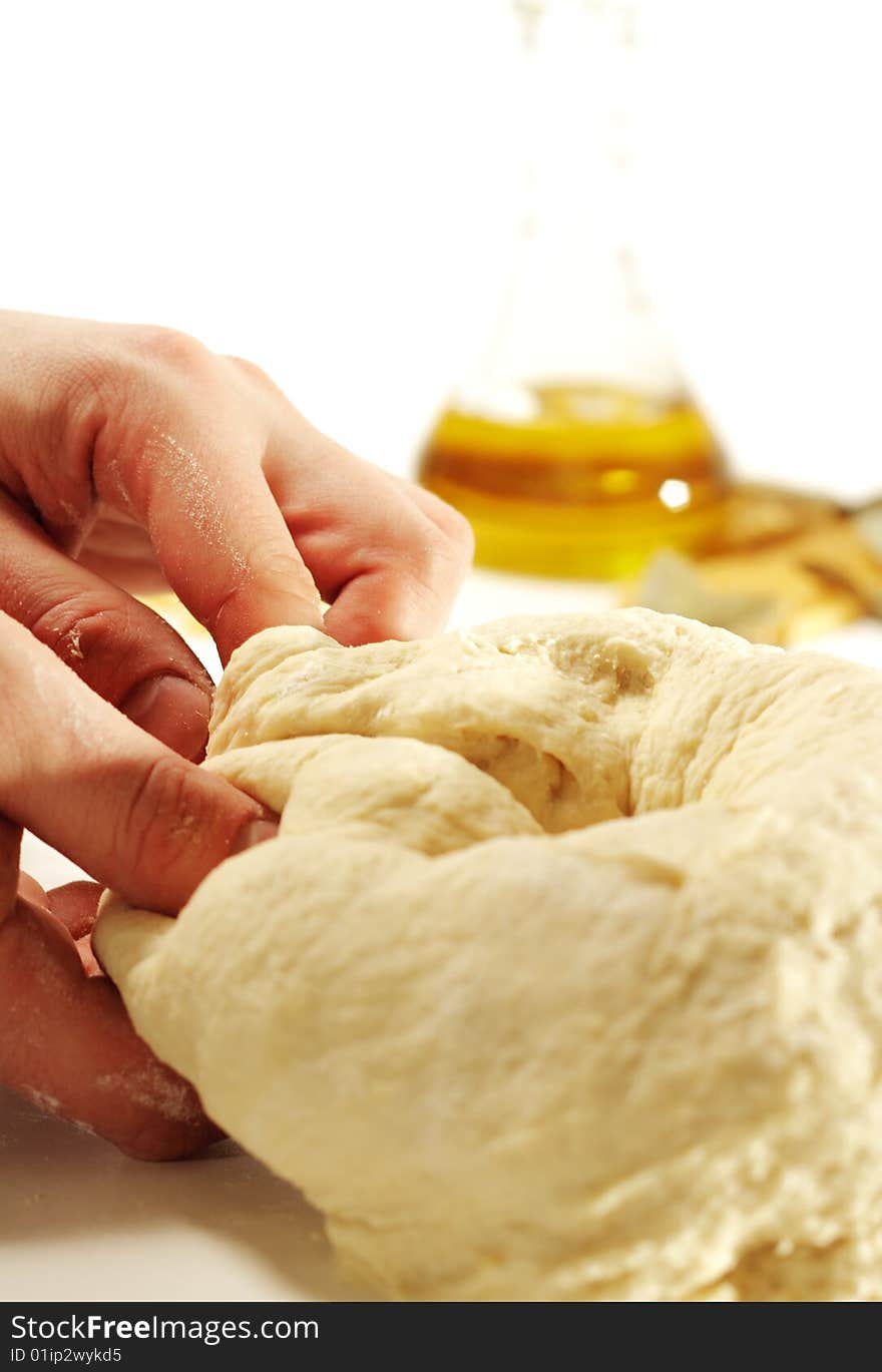 Dough Preparation with Olive Oil on a Background