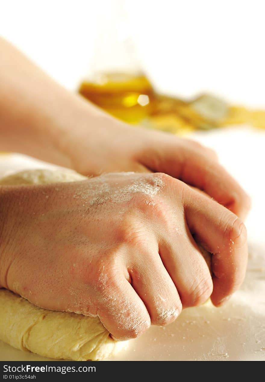 Dough Preparation with Olive Oil on a Background