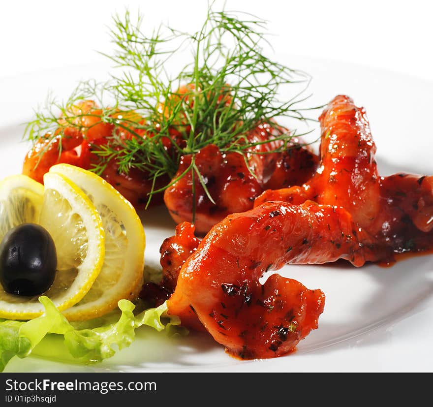 Seafood - Shrimps with Sauce Dressed with Salad Leaves, Dill, Lemon and Olives. Isolated on White Background