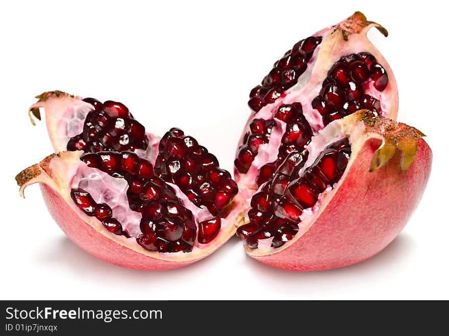 Juicy pomegranate on a white