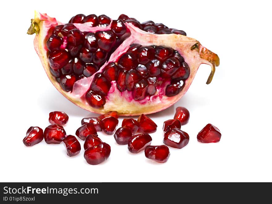 Juicy pomegranate on a white