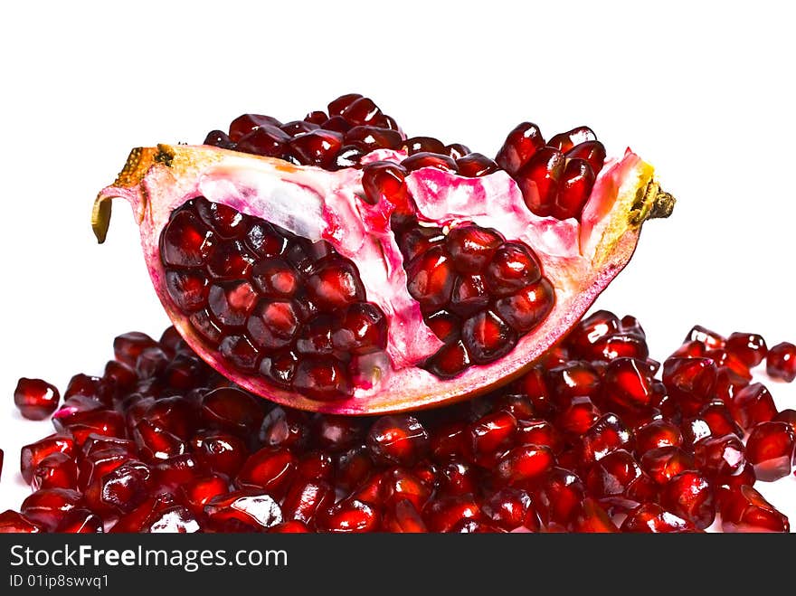 Juicy pomegranate on a white