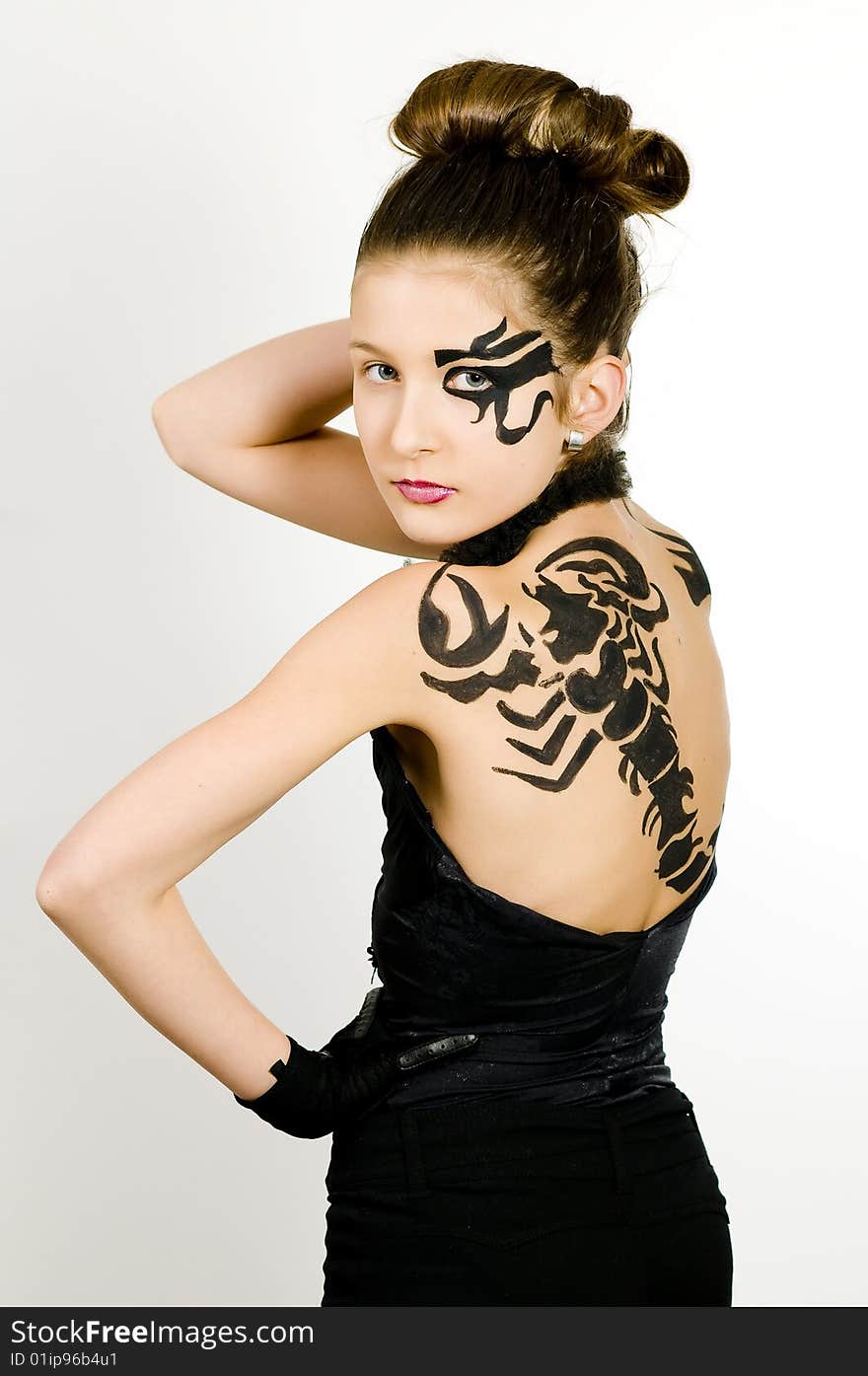 Girl with scorpio painted on back