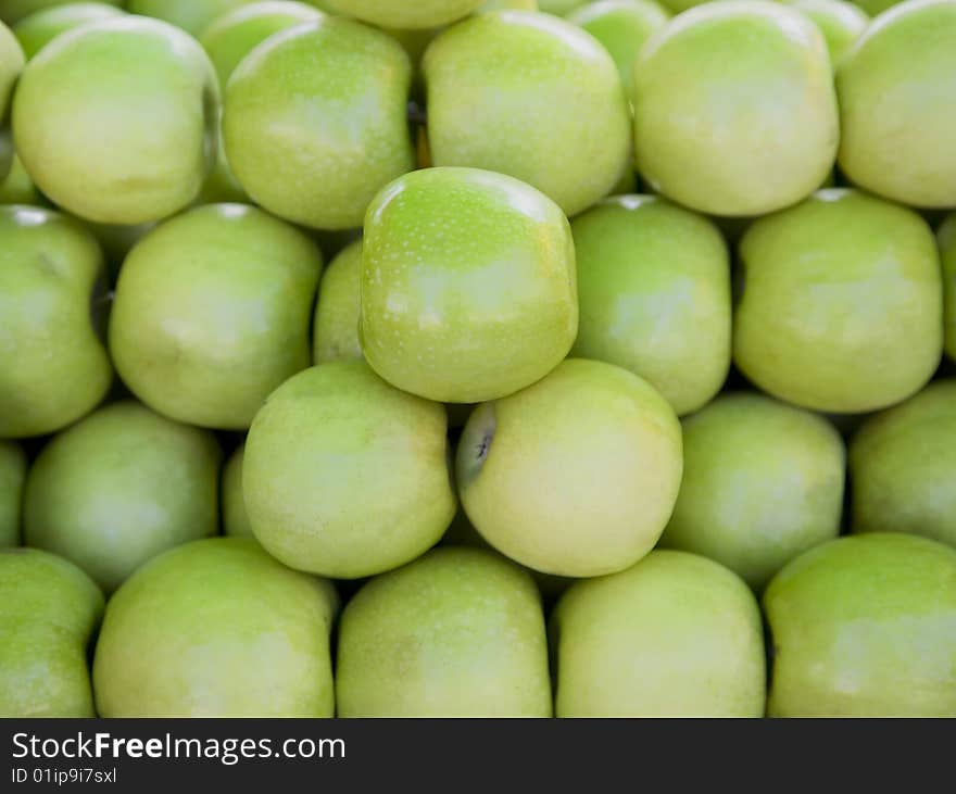 Row of Organic Granny Smith apples