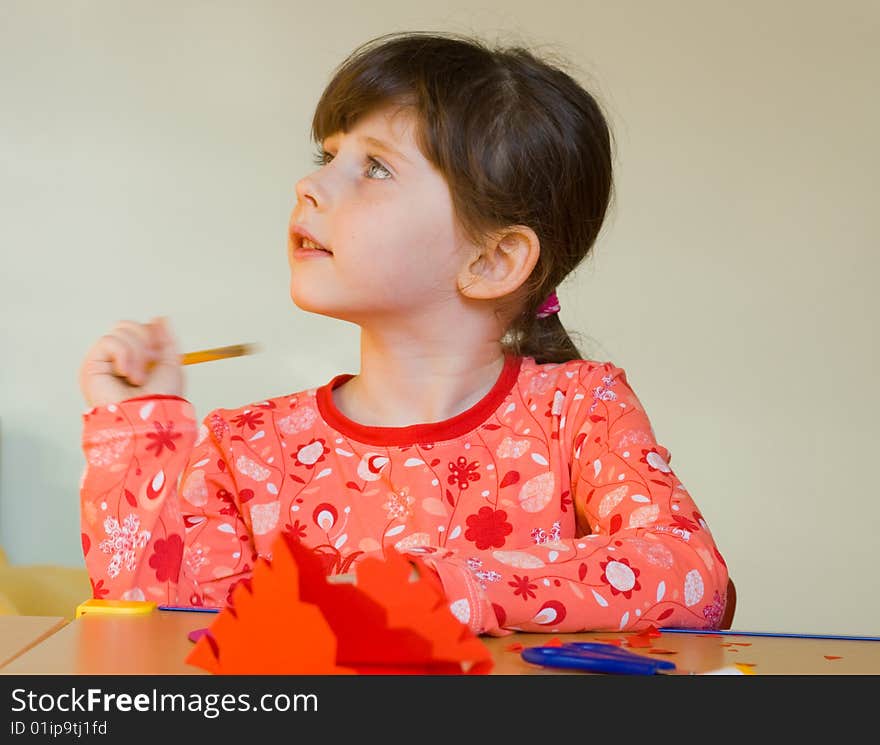 Cute 5 years old girl drawing