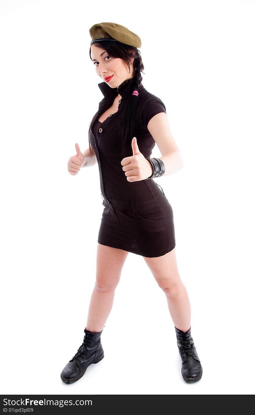 Young female with army cap and thumbs up