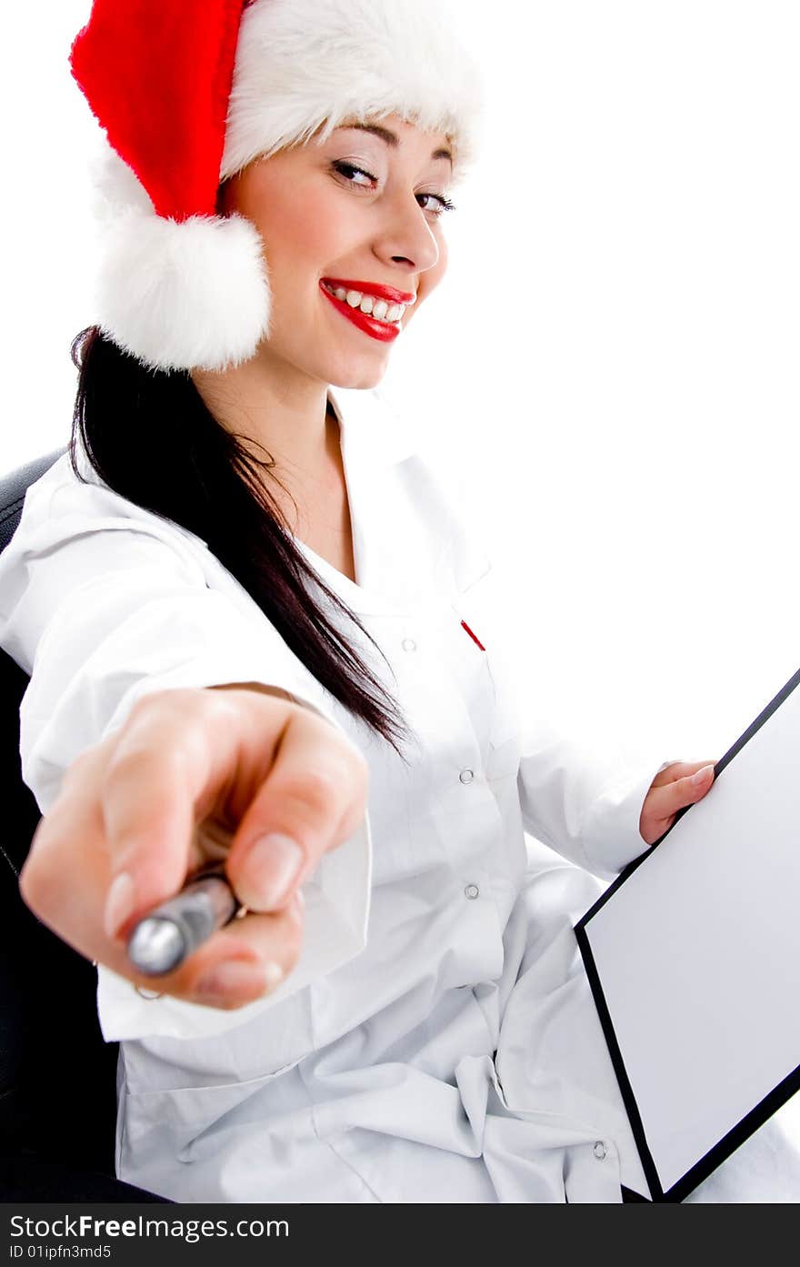 Young doctor wearing christmas hat on white background