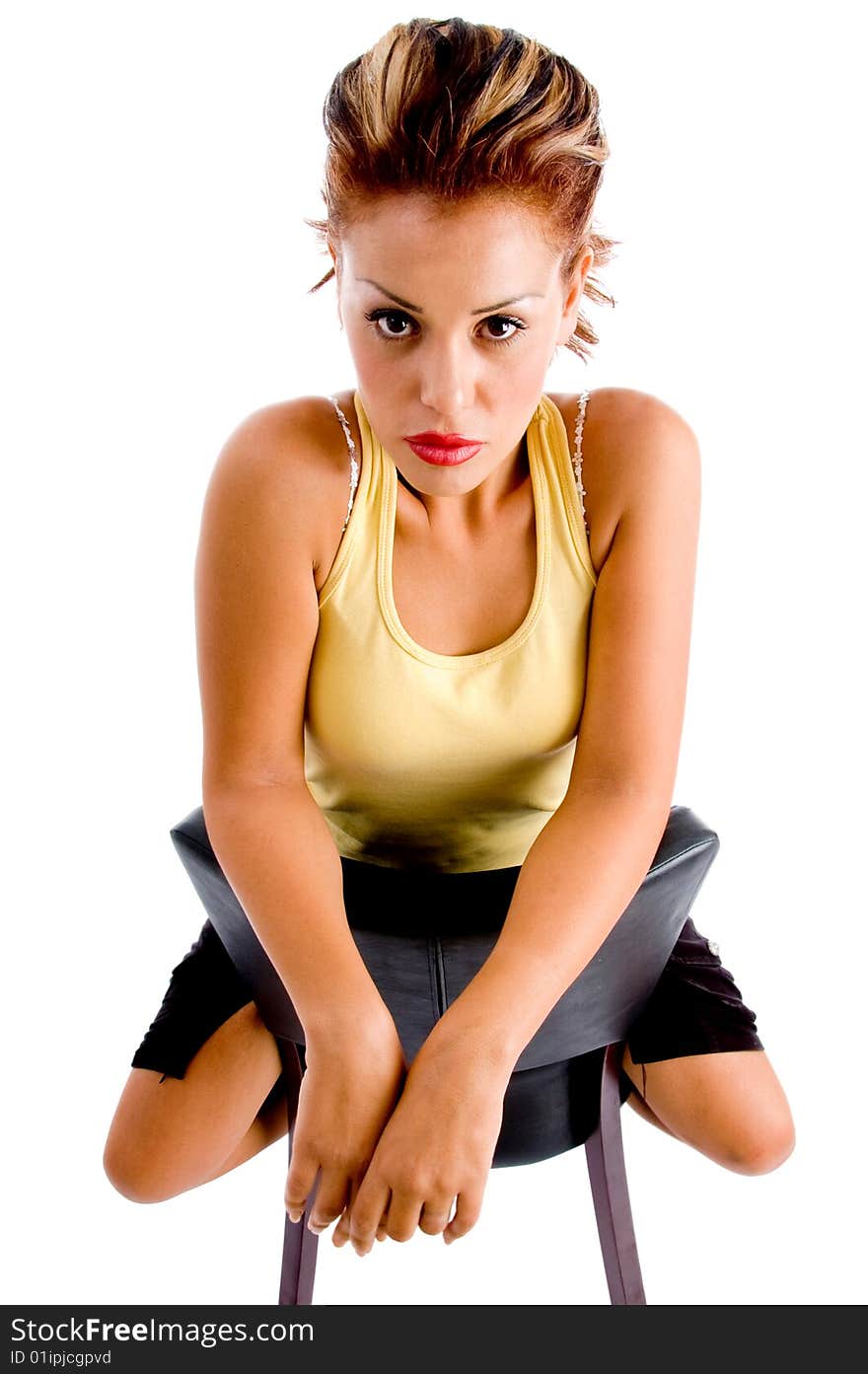 Blond e woman sitting on chair with white background. Blond e woman sitting on chair with white background