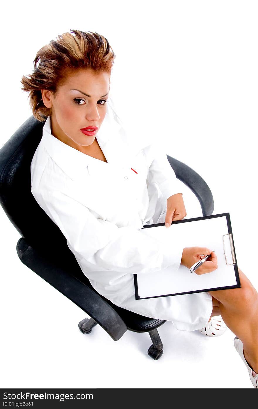 Sitting doctor with notepad and pen